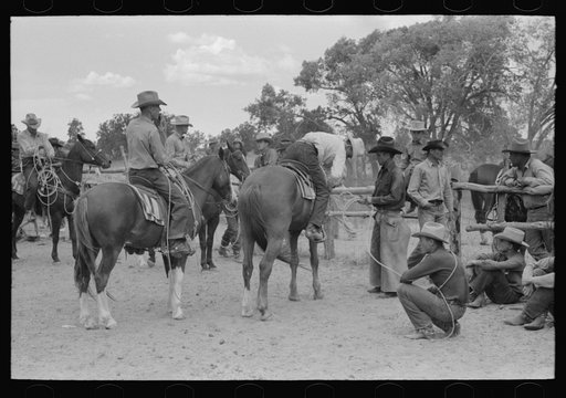 Cowboys on their horses at rodeo, Quemado, New Mexico