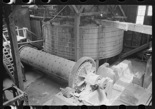 Old tube mill in foreground with agitating tank in background. Gold mine at Mogollon, New Mexico