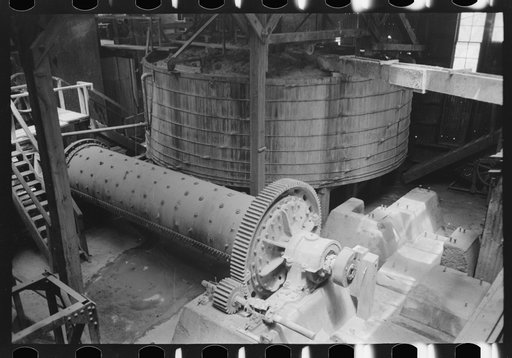 Untitled photo, possibly related to: Old tube mill in foreground with agitating tank in background. Gold mine at Mogollon, New Mexico