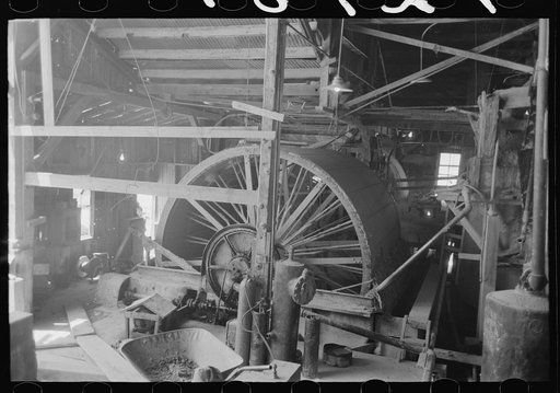 Untitled photo, possibly related to: Rotary vacuum filter used for removing cyanide solution containing gold from the tailings. Gold mine at Mogollon, New Mexico