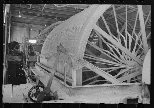 Untitled photo, possibly related to: Rotary vacuum filter used for removing cyanide solution containing gold from the tailings. Gold mine at Mogollon, New Mexico