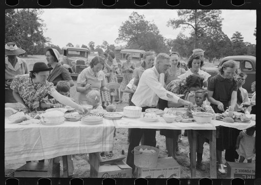 Farm folks, mostly homesteaders, at dinner during the all day community sing, Pie Town, New Mexico