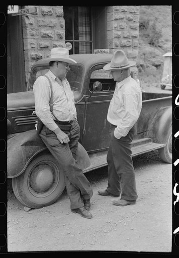 Untitled photo, possibly related to: Deputy sheriff and constable talking, Mogollon, New Mexico