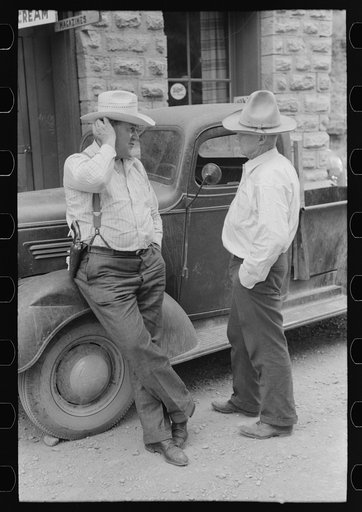 Deputy sheriff and constable talking, Mogollon, New Mexico