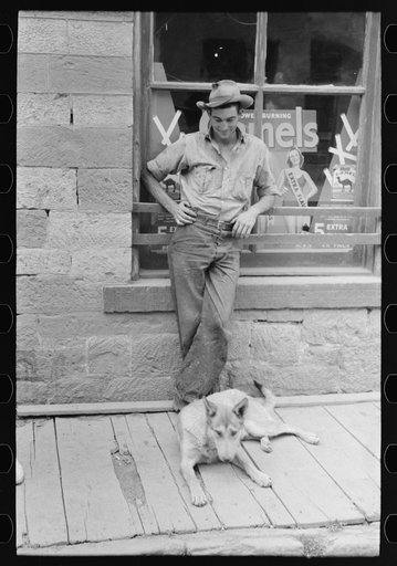Gold miner with his dog, Mogollon, New Mexico