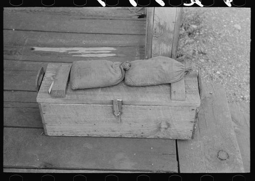 Samples of ore and box containing samples of milled tailing solutions which are sent to Silver City. Mogollon, New Mexico