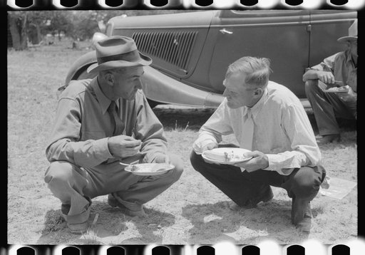 Eating dinner at all day community sing, Pie Town, New Mexico