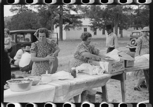 Taking out food for dinner at the day community sing, Pie Town, New Mexico