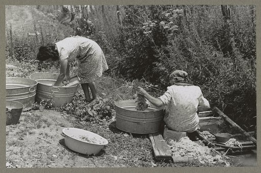 Washing along the irrigation ditch, Chamisal, New Mexico