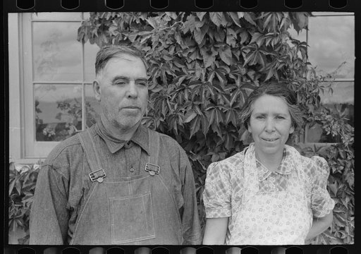 Spanish-American farmer and his wife, Chamisal, New Mexico
