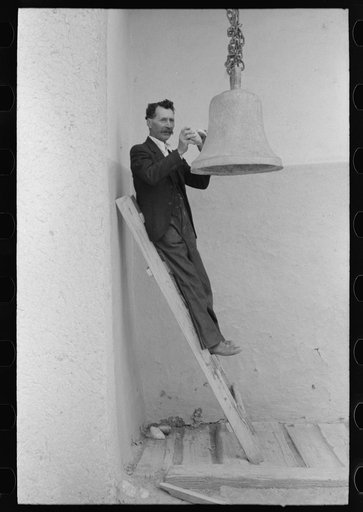 Untitled photo, possibly related to: Spanish-American ringing bell with rock at the Church of the Twelve Apostles, Trampas, New Mexico. Church is 350 years old