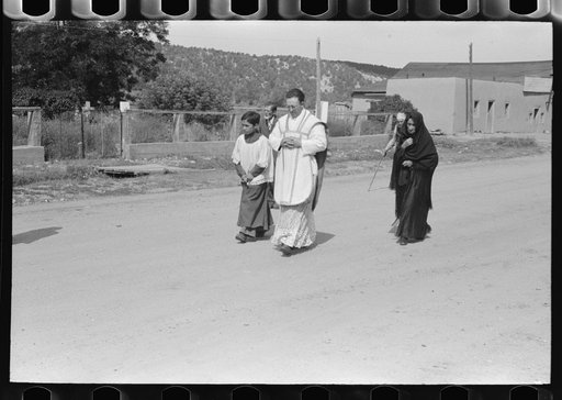 Bringing up the rear of the procession of Spanish-American Catholics held to honor a saint, Penasco, New Mexico
