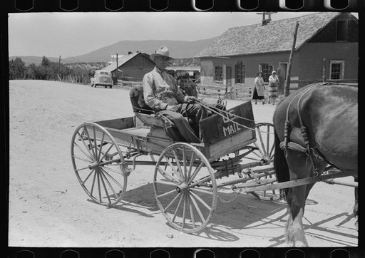 Untitled photo, possibly related to: The mail for Penasco comes into town in this wagon. Penasco, New Mexico