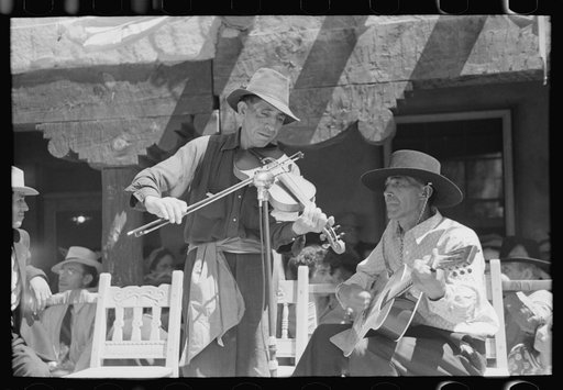 Untitled photo, possibly related to: Spanish-American musicians playing at the fiesta at Taos, New Mexico