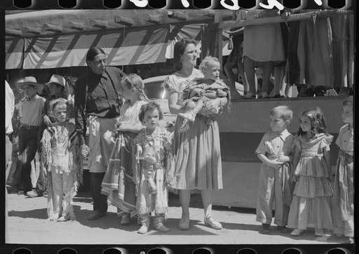 Visitors to the fiesta, Taos, New Mexico