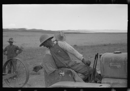 Untitled photo, possibly related to: Mormon farmer working on FSA (Farm Security Administration) cooperative drill, Oneida County, Idaho. While the members of the cooperative live in Snowville, Utah, some of them farm in Oneida County, Idaho