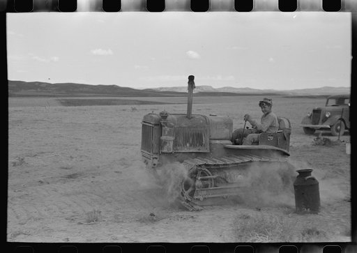 Son of dry farmer operating tractor, Oneida County, Idaho