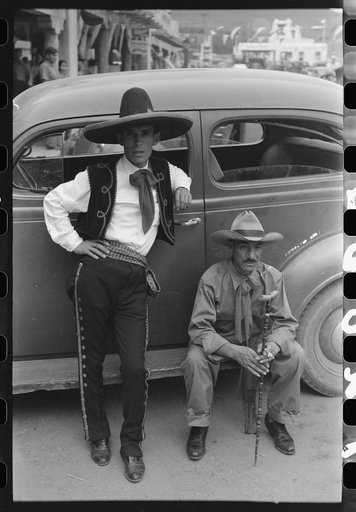 Spanish-American men at fiesta, Taos, New Mexico