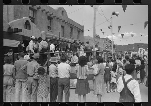 Crowd watching native Spanish-American dances at fiesta, Taos, New Mexico