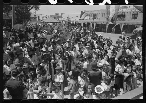 Crowd of people watching the dance at fiesta, Taos, New Mexico