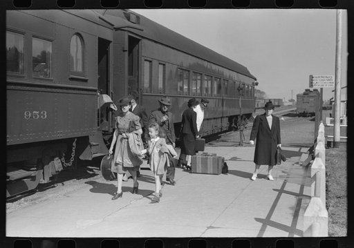Untitled photo, possibly related to: Passenger, alighting from morning train, Montrose, Colorado