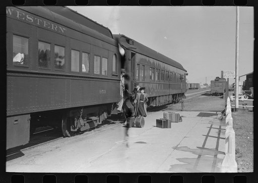 Untitled photo, possibly related to: Passenger, alighting from morning train, Montrose, Colorado
