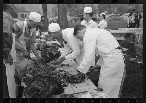 Making barbecue sandwiches at the free barbecue on Labor Day, Ridgway, Colorado