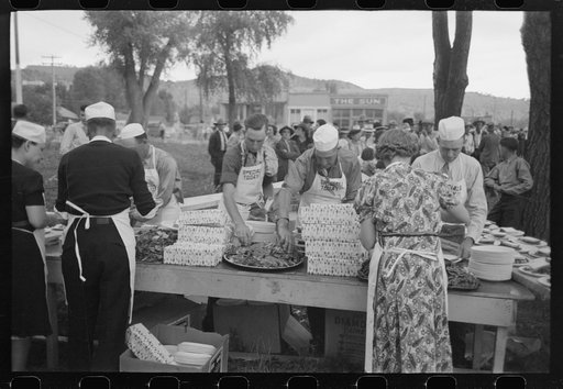 Serving the barbecue at the free barbecue on Labor Day, Ridgway, Colorado