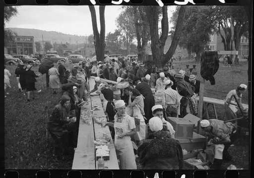 Untitled photo, possibly related to: Making barbecue sandwiches at the free barbecue on Labor Day, Ridgway, Colorado