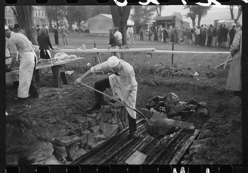 Taking barbecue off the fire, Labor Day, Ridgway, Colorado