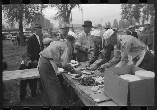 Serving barbecue at the free barbecue on Labor Day at Ridgway, Colorado