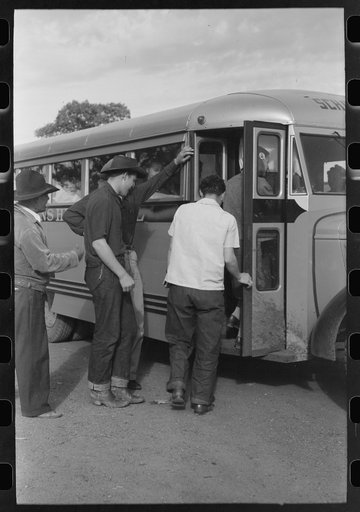 Schoolchildren of Concho, Arizona boarding the bus to go to the high school at St. Johns, Arizona