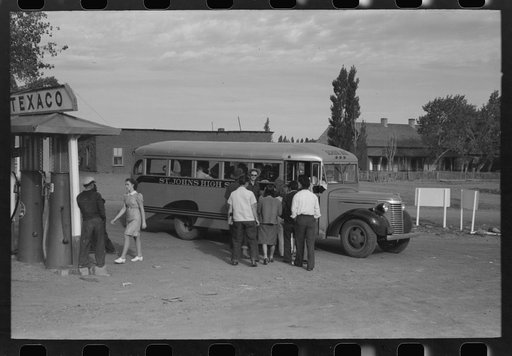 Schoolchildren of Concho, Arizona boarding the bus to go to the high school at St. Johns, Arizona