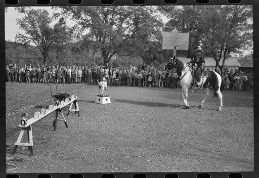 Untitled photo, possibly related to: High school horse performs before children of construction workers at Summit City School, Summit City, California