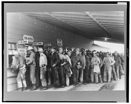 Construction workers lined up to be paid off, Shasta Dam, Shasta County, California