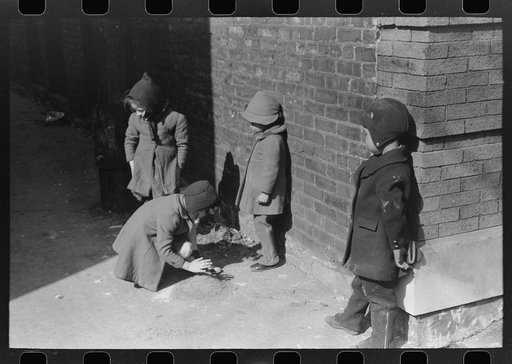 Untitled photo, possibly related to: Where the Negro and white sections on the South Side meet, the white and Negro children sometimes play together, Chicago, Illinois