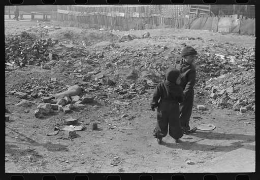 Untitled photo, possibly related to: Children playing near dead dog, South Side of Chicago, Illinois