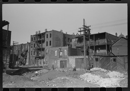 Untitled photo, possibly related to: Vacant lots and apartment buildings in Negro section of Chicago, Illinois