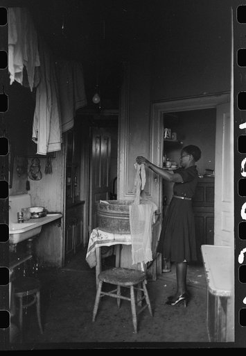 Kitchen of apartment occupied by Negroes, South Side of Chicago, Illinois