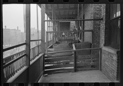 Back porches of apartment building in Negro section of Chicago, Illinois