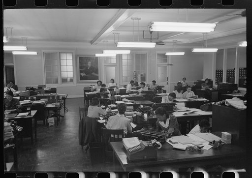 Untitled photo, possibly related to: Negro working in insurance company office, South Side of Chicago, Illinois