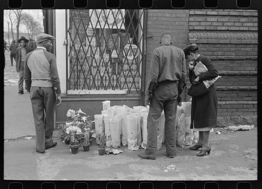 Selling Easter lilies on sidewalk on Easter morning, South Side of Chicago, Illinois