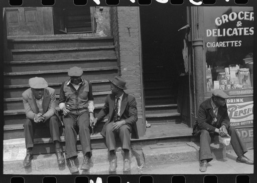 Untitled photo, possibly related to: People sitting on front porches in Negro section of Chicago, Illinois