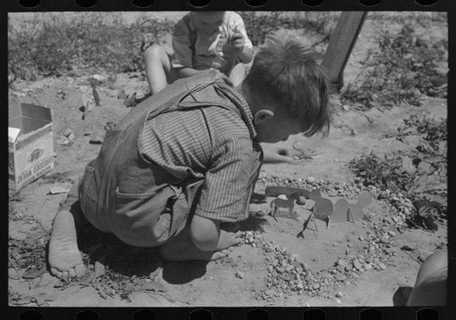 Son of the farm worker at the FSA (Farm Security Administration) labor camp. Caldwell, Idaho