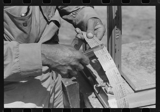 When you deliver a hamper of peas to the checker he gives you this check redeemable once a week. Labor contractor's pea pickers crew.  Nampa, Idaho.