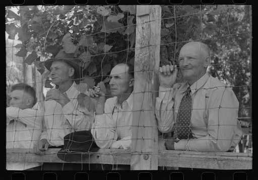 Spectators watch the baseball game on the Fourth of July at Vale, Oregon