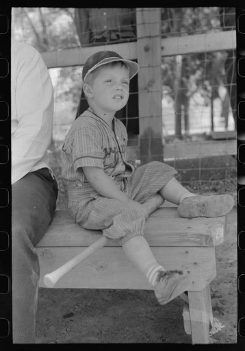 Spectators watch the baseball game on the fourth of July at Vale, Oregon