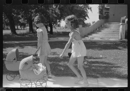 Untitled photo, possibly related to: Little girls with their dolls and buggies. Caldwell, Idaho