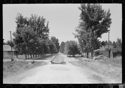 Untitled photo, possibly related to: Sprinkling the dusty streets. Caldwell, Idaho