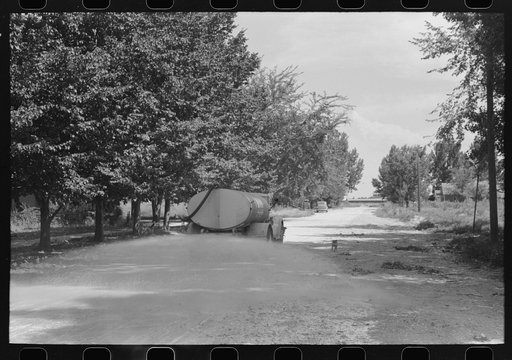 Sprinkling the dusty streets. Caldwell, Idaho